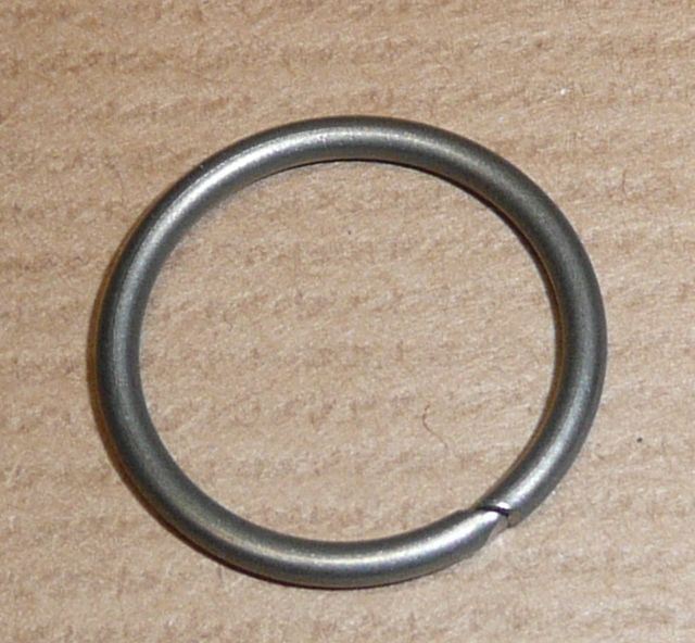 Joint d’injecteur d’origine PSA — Citroën / Peugeot 1.6HDI segments.métal — 1609848880 — photographie de la pièce d’origine