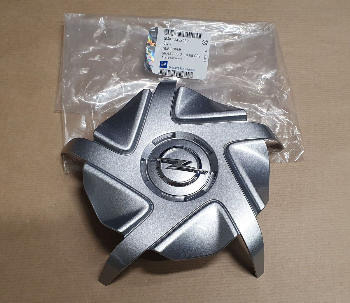 Cache central de jante pour Opel Corsa E — 13432962 — vue 1