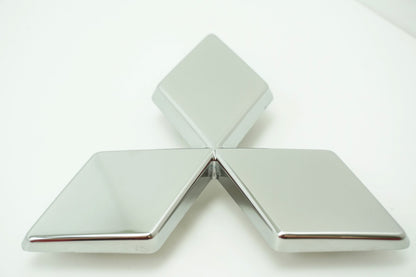 Pièce d'origine Emblème Logo pour Mitsubishi 628909828R