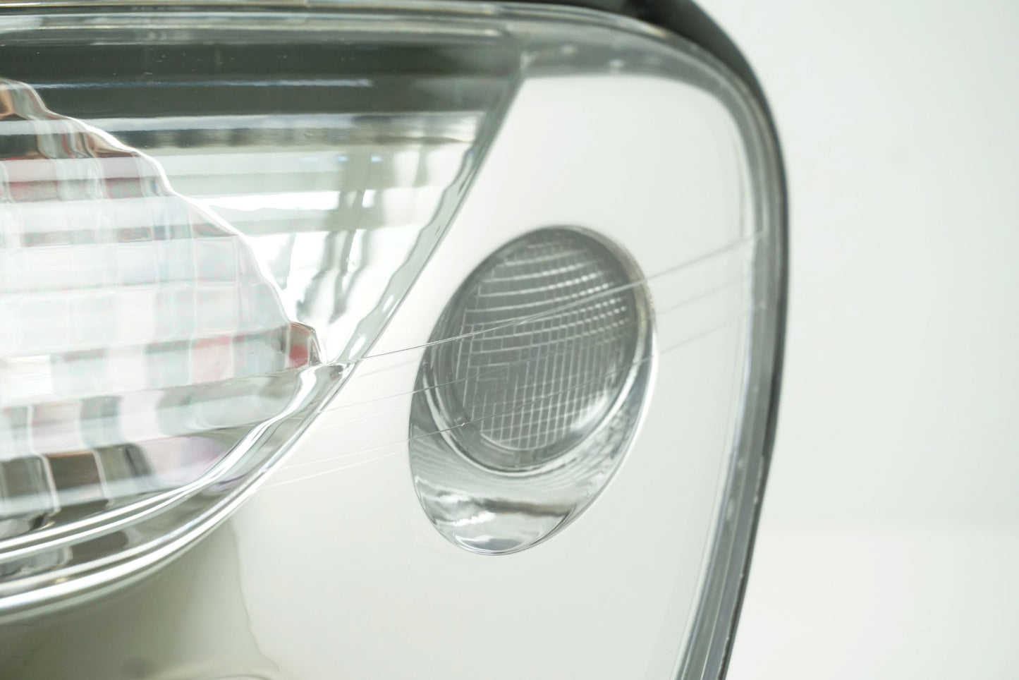 Pièce d'origine Phare gauche pour Renault Scenic I phase 2 7701047604