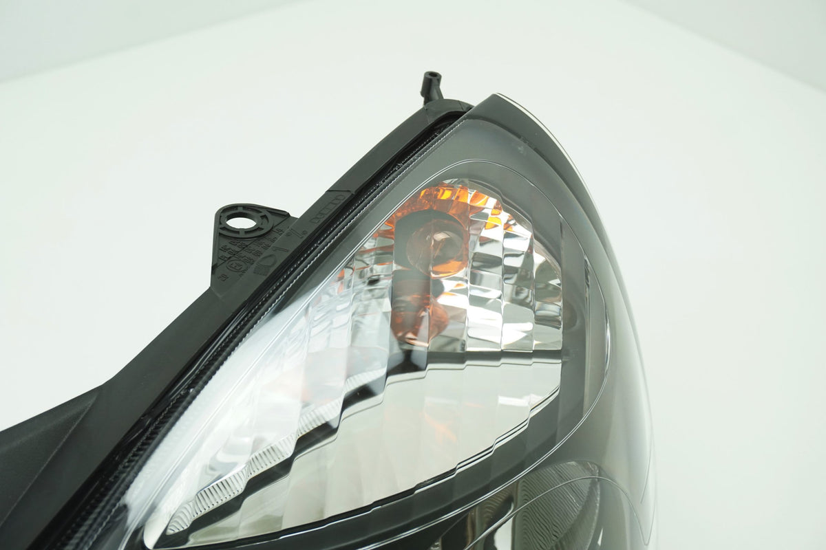 Pièce d'origine Phare avant gauche pour Renault Clio II 7701054058