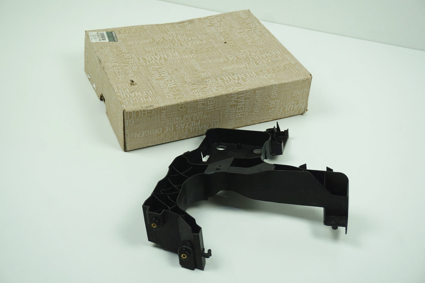 Pièce d'origine Glissière de fixation de phare droite pour Renault 8200137496