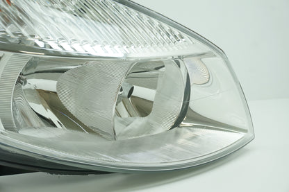 Pièce d'origine Phare droit pour Renault Scenic II 7701064130
