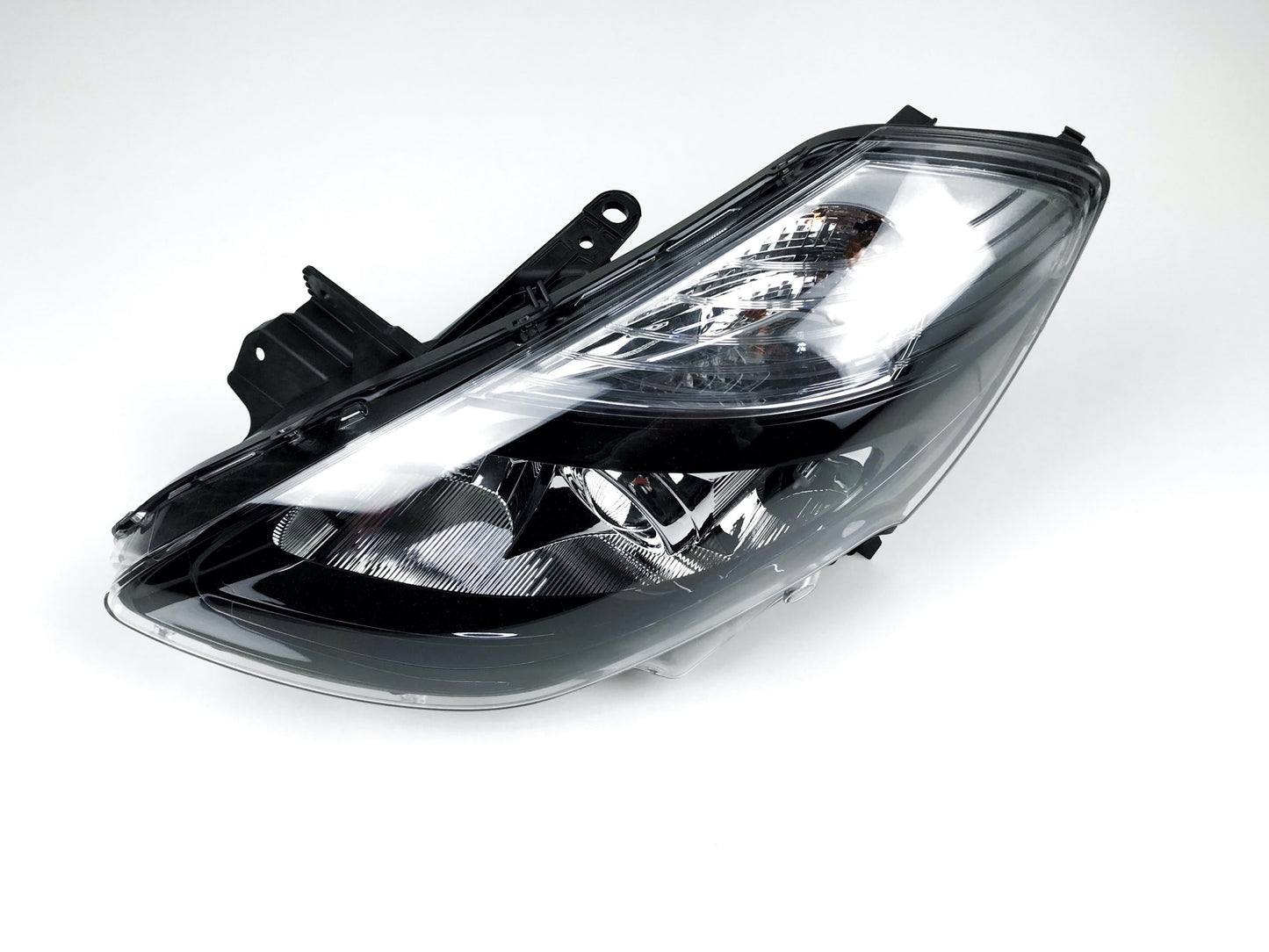 Pièce d'origine Phare gauche noir avec lentille pour Renault Clio III phase 2 260605782R.