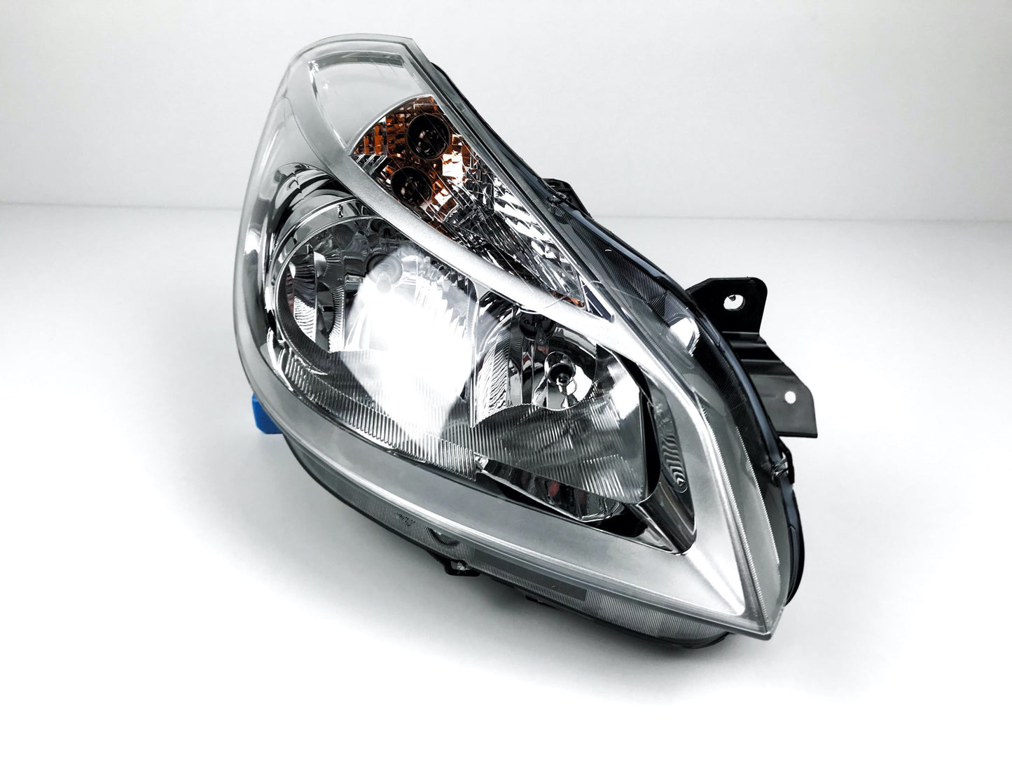 Pièce d'origine Phare avant droit chrome pour Renault Clio III 260100203R.