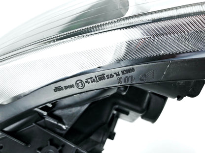 Pièce d'origine Phare avant pour Renault Clio III 260100203R.