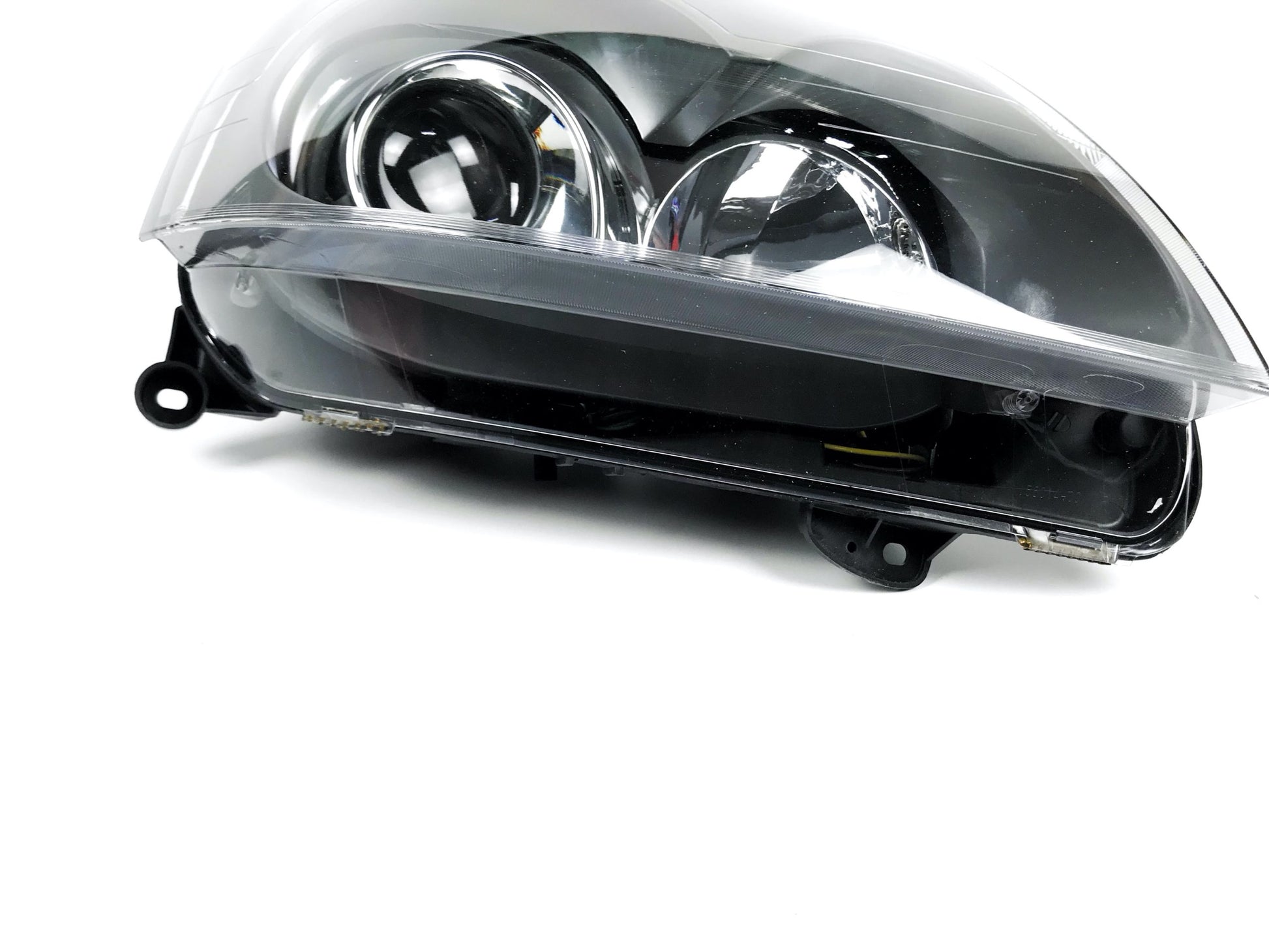 Pièce d'origine Phare xénon droit pour Renault Clio II 7701057660.